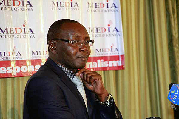 Media council of Kenya CEO Harun Mwangi looks on during the launch of the council's launch of the radio talk show report titled 'Free Speech or Cheap Talk?' assessing the application of ethical standards and professionalism in talk radio in Kenya at the Hilton Hotel on May 20, 2014  DIANA NGILA (NAIROBI)