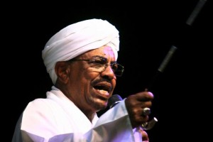 Sudan's President Omar Hassan al-Bashir speaks to the crowd after a swearing-in ceremony at green square in Khartoum, June 2, 2015. REUTERS/Stringer