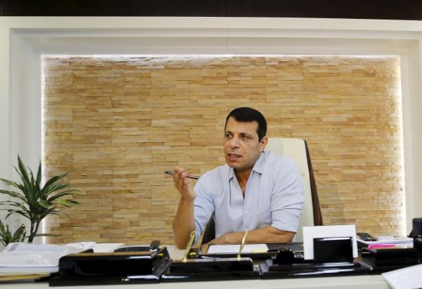 Mohammed Dahlan gestures during an interview with Reuters at his office in Abu Dhabi, UAE September 13, 2015. From his roots in a Gaza refugee camp, Dahlan scrambled to the top of Palestinian politics by his early 40s, backed by a reputation as a charismatic enforcer, someone who commanded loyalty and got things done. The Americans and British liked his style. To match Insight PALESTINIANS-POLITICS/  Picture taken September 13, 2015. REUTERS/Stringer