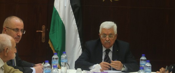 RAMALLAH, WEST BANK - SEPTEMBER 1 :  Palestinian President Mahmoud Abbas (R) and Palestinian Prime Minister Rami Hamdallah (2nd L) attend a meeting with Executive Committee of Palestine Liberation Organization in Ramallah, West Bank on September 1, 2015. (Photo by Issam Rimawi /Anadolu Agency/Getty Images)