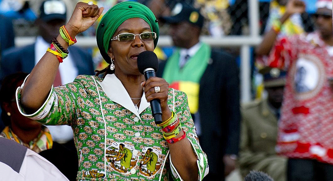 Zimbabwean President's wife, Grace Mugabe raises her fist as she addresses at a rally in Harare on July 28, 2013. Zimbabweans go to the polls on July 31 to choose between veteran President Robert Mugabe and long-time rival Morgan Tsvangirai. AFP PHOTO / ALEXANDER JOE (Photo credit should read ALEXANDER JOE/AFP/Getty Images)
