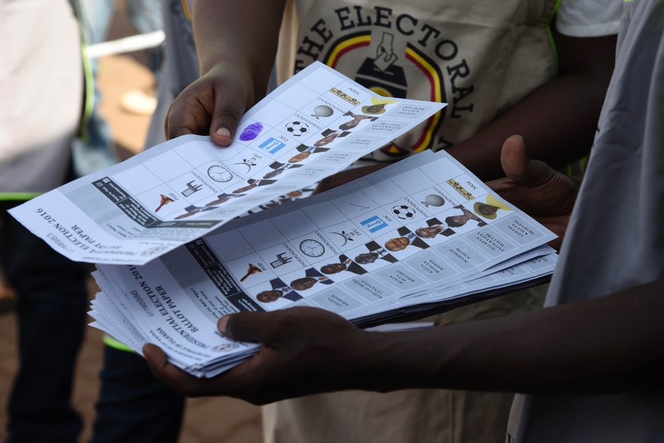 Electoral commission presiding officers count ballot papers in Kampala on February 18, 2016, during presidential and parliamentary elections. International election observers warned Thursday that hours-long delays in delivering ballot papers in Uganda's national elections would not "inspire trust" in the polling. Voting in Uganda was due to begin at 07:00 am (0400 GMT) but was stalled for several hours in some polling stations in parts of the city and the surrounding Wakiso district, where ballot boxes and papers did not arrive on time. Support for the opposition is traditionally strong in the capital.  / AFP / ISAAC KASAMANI        (Photo credit should read ISAAC KASAMANI/AFP/Getty Images)