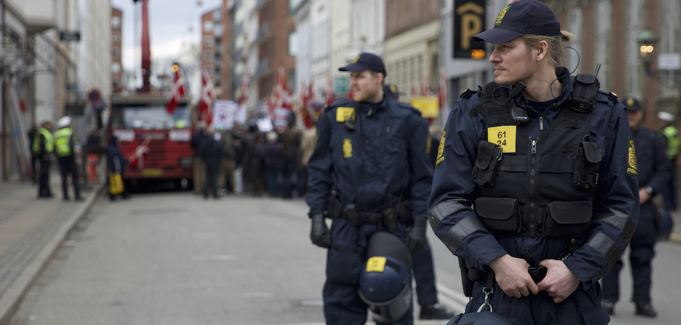 The anti-muslim Danish Pegida clone "For Frihed" (For Freedom) marched in the centre of Copenhagen, Denmark on 9 April 2016 protected by upwards a hundred police, while some 60 anti-Pegida demonstrators attempted to disrupt the march. The march took place on the date, when Denmark was occupied by German forces in 1940.  In photo: Policemen protection the marchers. Denmark 9 April 2016 (Photo by Noe Falk Nielsen/NurPhoto)