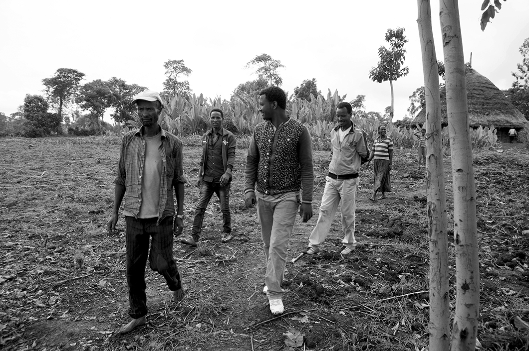 The family walks through the family farm.